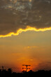 © ric - Sunset sky with clouds. Nature background. Orange sunset sky.