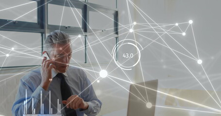 Poster - Image of statistics and data processing over caucasian businessman using laptop in office
