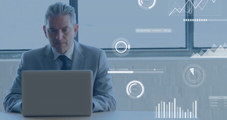 Poster - Image of statistics and data processing over caucasian businessman using laptop in office