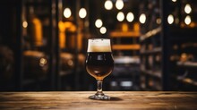 Glass Of Dark Beer On A Wooden Table In A Pub Or Restaurant Generative AI