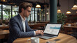 © Cryido - businessman working on laptop