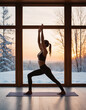 A silhouette of a woman doing yoga on background of windows with beautiful winter landscape with trees in the snow and sunlight, young yogi girl in warrior's yoga position
