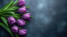 Spring Holiday, Women's Day. Purple Tulips On Black Stone Background.