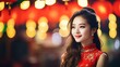 © Phoophinyo - A Beautiful Asian woman wearing Chinese national costume (cheongsam) smiles on Chinese New Year in a Chinese community, bokeh blurred background. City lights are out of focus. Background image,