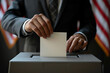 Man putting voting card in ballot box on blurred background, closeup