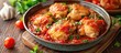 Traditional chicken cacciatore in tomato sauce, seen from the front.