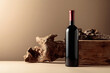 Bottle of red wine with old wood on a beige background.
