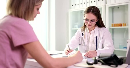 Wall Mural - Doctor gives prescription for medicine to patient in clinic. Prescription drugs concept