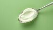 Fresh Natural Yogurt or Cream on the Metal Spoon

