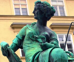 Wall Mural - Vienna. Austria. November 16, 2019. View of the central streets of the Austrian capital with historical bouilding. Ancient fountain.