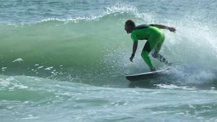 Poster - Surfer rides the wave in Brazil