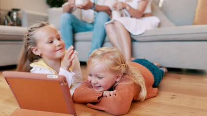 Poster - Children, tablet and sisters on a floor with games, fun and bonding while streaming at home together. Happy family, kids and siblings in a living room with digital, app or online cartoon in a house