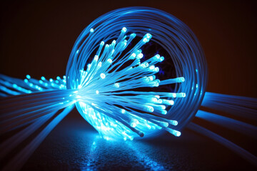 Extremely close-up of an optical cable with glowing fibers.