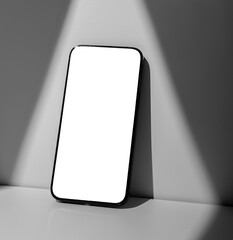 Poster - Mobile phone screen mockup, blank smartphone display leaning on wall in sun beam