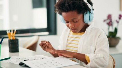 Aufkleber - Black child, calculator and writing in book for mathematics, learning or education at home. Young African kid or little boy taking notes with headphones for calculation, counting numbers or homework
