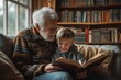 Grandfather with his grandson, reading an old book together and have a cheerful time.	