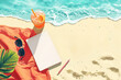 Playful scene with a notepad placed on a sandy beach, surrounded by colorful beach towel, sunglasses, and a refreshing drink.