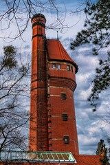 Poster - Old brick water tower and evening sky