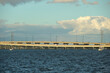 Barron Collier Bridge and Gilchrist Bridge in Florida with moving traffic. Transportation infrastructure in Charlotte County connecting Punta Gorda and Port Charlotte over Peace River