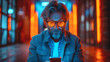 Man  in glasses looking at her phone - sitting on floor - neon stylish fashion - close-up low angle shot - holding a phone - cell - mobile phone 