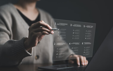 Wall Mural - Woman evaluating questionnaire on online laptop computer. assessment survey online, choose correct answer in test, questions test, online exam, quiz knowledge, filling out an survey form. checklist,