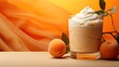Fresh apricots with whipped cream on a bright orange background.