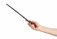 Woman Holding Wooden Magic Wand On White Background, Closeup