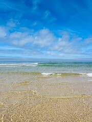 Sticker - Transparent sea water, beautiful azure sea coast, sand beach, natural blue sea background