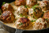 Fototapeta Dinusie - a pan of meatballs with sauce