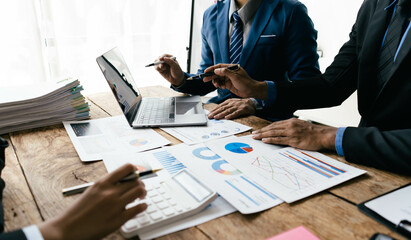 Aufkleber - business people or accountant using calculator while working analytical business report on the workplace, accounting concept, Serious and focused financier accountant on paper work inside office,