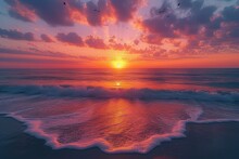 Beach Sunset With Pink Sky And Purple Water