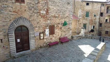 Wall Mural - Scenic sight in the village of Campiglia Marittima, on a sunny summer afternoon. In the Province of Livorno, in the Tuscany region of Italy.