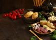 © Olga Kriger - cheese and meat antipasto with olives and basil