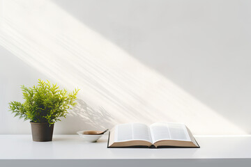 Wall Mural - Open book and a cup of coffee on a white wooden table