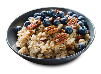 Wall Mural - Oatmeal Bowl, Oat Porridge with Blueberry and Pecans in a Bowl on White Background