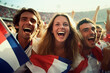 © Pavel - Stadium spectators with French flags, team support, championship event, enthusiastic crowd