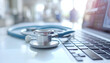 © Oleksiy - medical stethoscope on laptop keyboard on blurred doctor and white hospital background