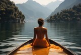Fototapeta  - Serene and elegant, a woman glides through the tranquil waters of a mountain lake, her flowing dress and graceful paddle mirroring the calm beauty of nature surrounding her