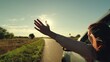 © Валерий Зотьев - girl rides car with her hand out window, sun glare sunset, wind face, summer vacation mood, people travel, wind freedom sunset, hand wind freedom, girl looking out car window catching wind with hand
