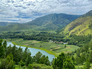 Wall Mural - Cloudy Sky Against The Lake. Lake Toba taken from Sibea-bea hills, North Sumatra.