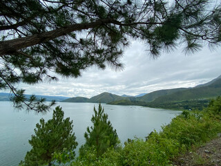 Wall Mural - Cloudy Sky Against The Lake. Lake Toba taken from Sibea-bea hills, North Sumatra.