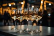 A symphony of elegance and indulgence, as sparkling wine glasses gather on a table, waiting to be filled with the intoxicating nectar of celebration and sophistication