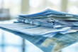 Stack of Newspapers and Papers with Business and Finance News: Information and Media Concept with Heap of Journals