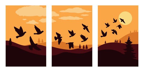 Wall Mural - Black silhouettes of flying birds against a background of nature