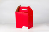 Fototapeta Psy - Red cardboard box, isolated on white