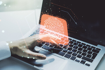 Aufkleber - Double exposure of abstract creative fingerprint hologram with hands typing on laptop on background, protection of personal information concept