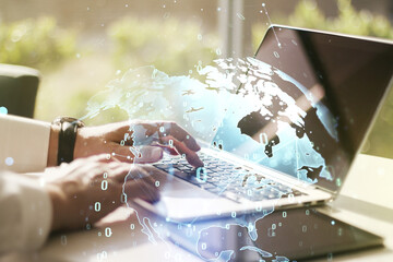 Poster - Abstract creative coding concept with world map and hands typing on laptop on background. Multiexposure