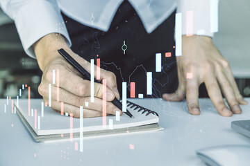 Poster - Multi exposure of abstract creative financial graph with hand writing in notepad on background, forex and investment concept