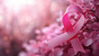 pink ribbon on a blurred background, symbolizes breast cancer