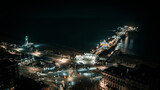 Fototapeta Londyn - Aerial view of a seaside, Brighton Pier and beach in night lights, Brighton, East Sussex, UK